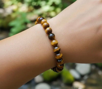 Bracelet oeil de tigre extra naturelle 8mm porté au poignet